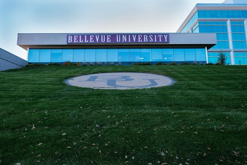 bellevue univerity sign on grass