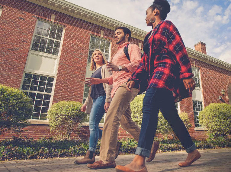 students walking together on campus